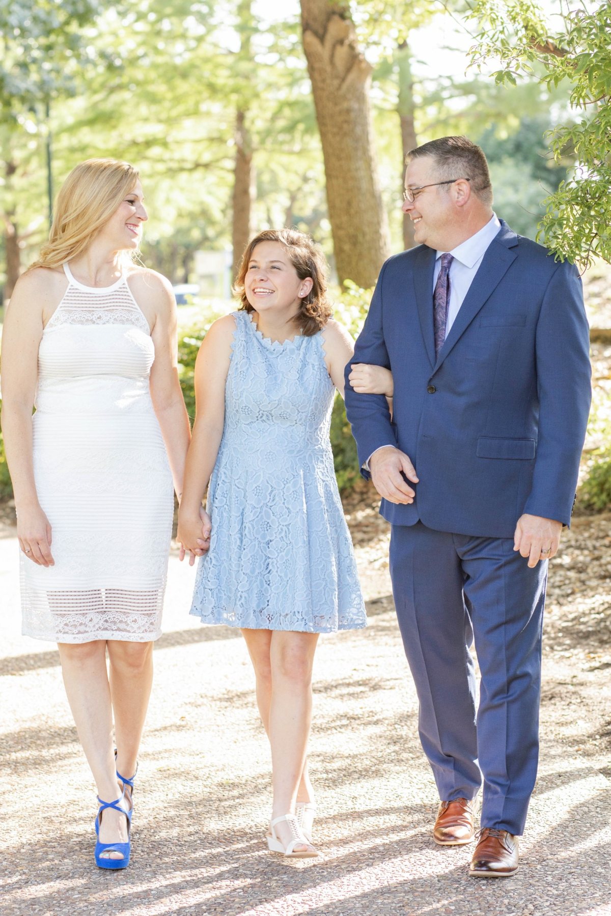 The Hemmingway family walking together outdoors in Texas.