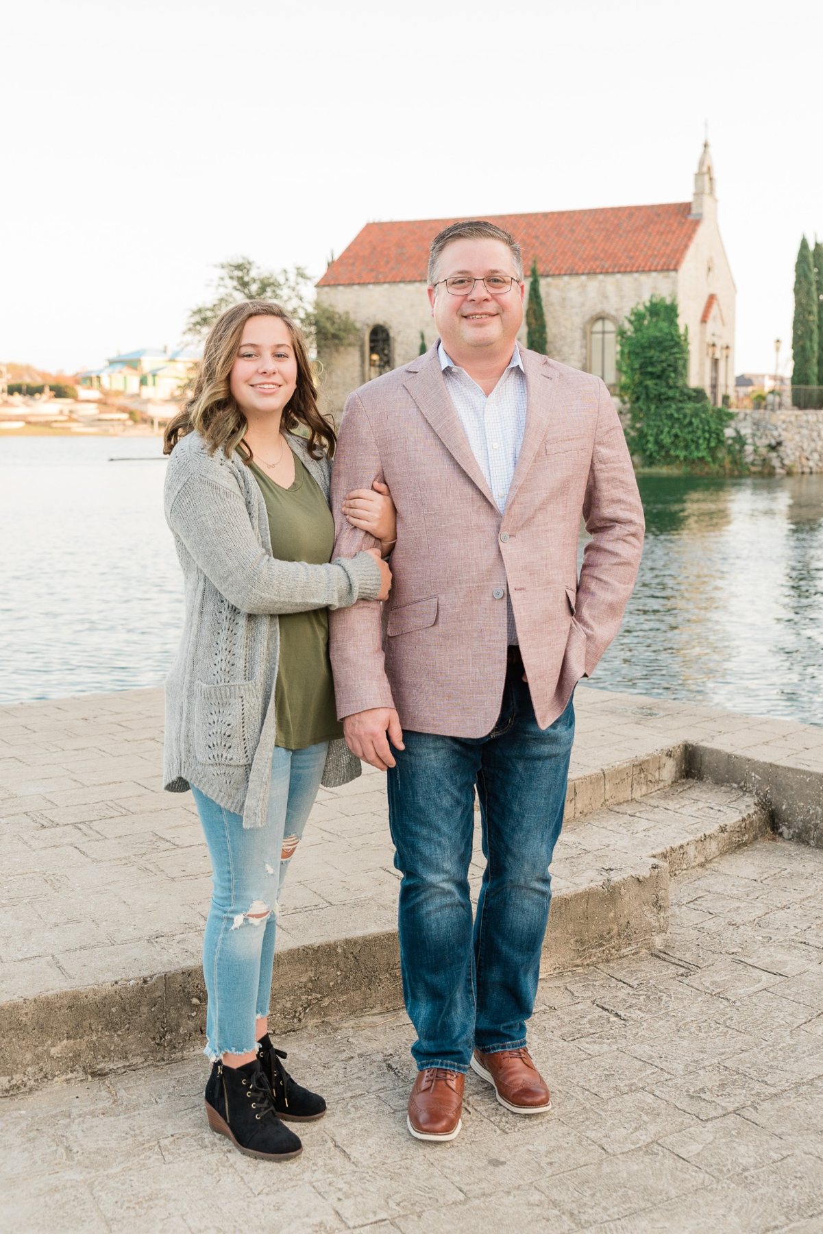 Jim Hemmingway with his daughter during a lakeside family photo session in Texas.